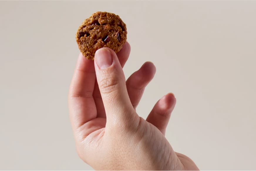 person holding a supplement